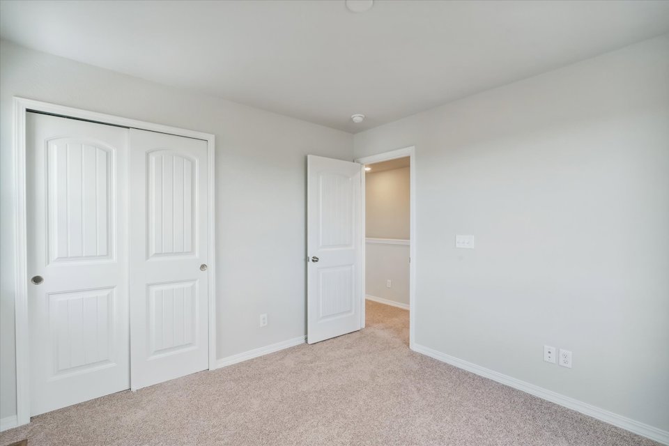 A room with white doors.