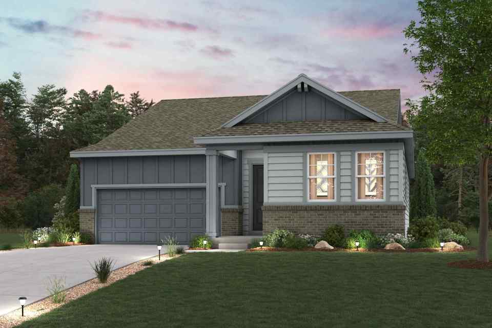 A house with a lawn in front of it.