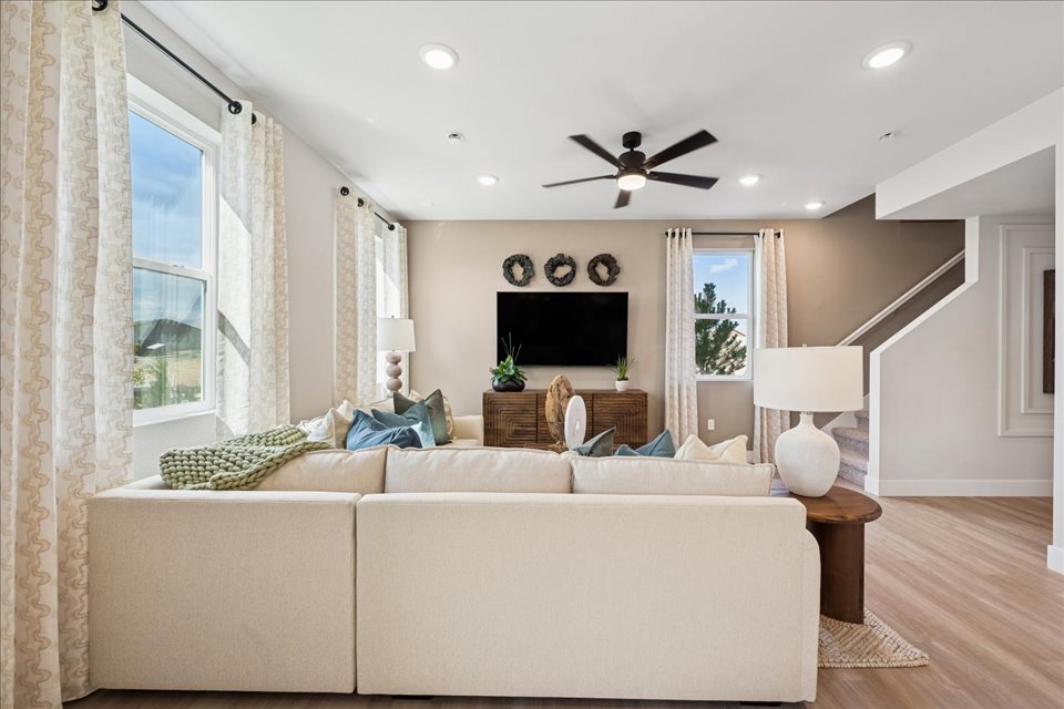 A living room with a large window.