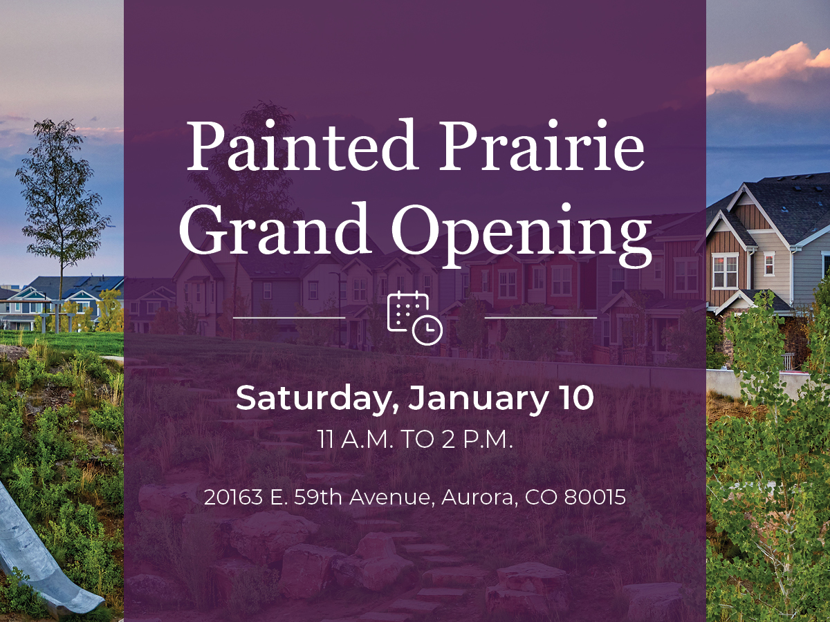 A sign with a house in the background.