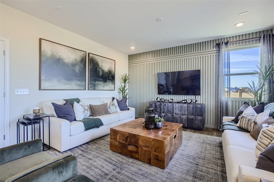 A living room with a fireplace.