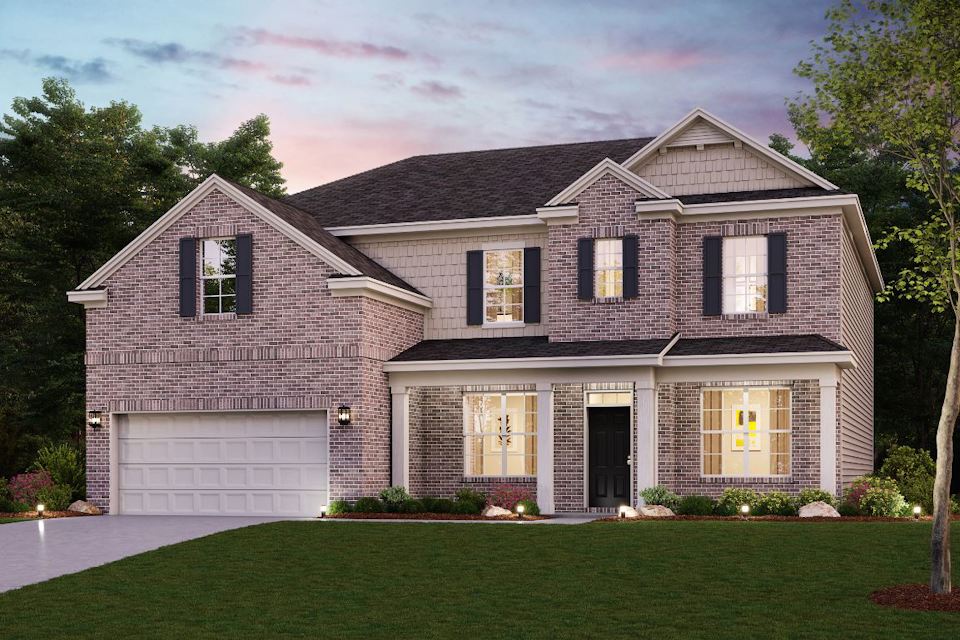 A house with a large front yard.