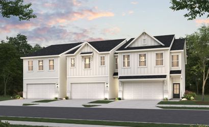 A large house with a driveway.