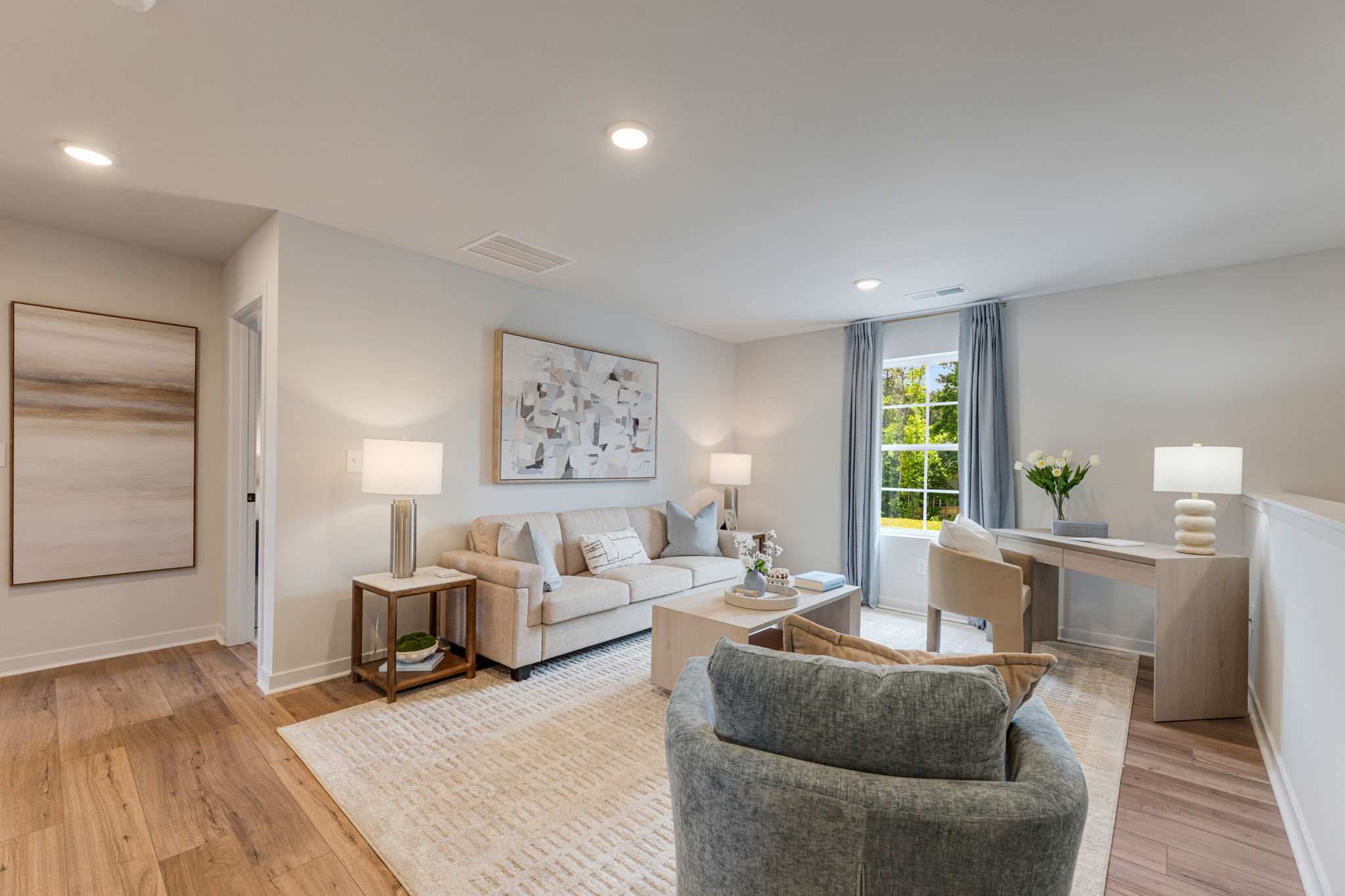 A living room with a couch and a coffee table.
