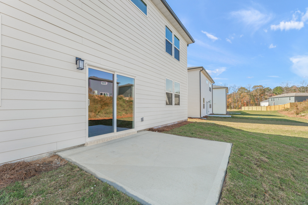 A white house with a glass door.