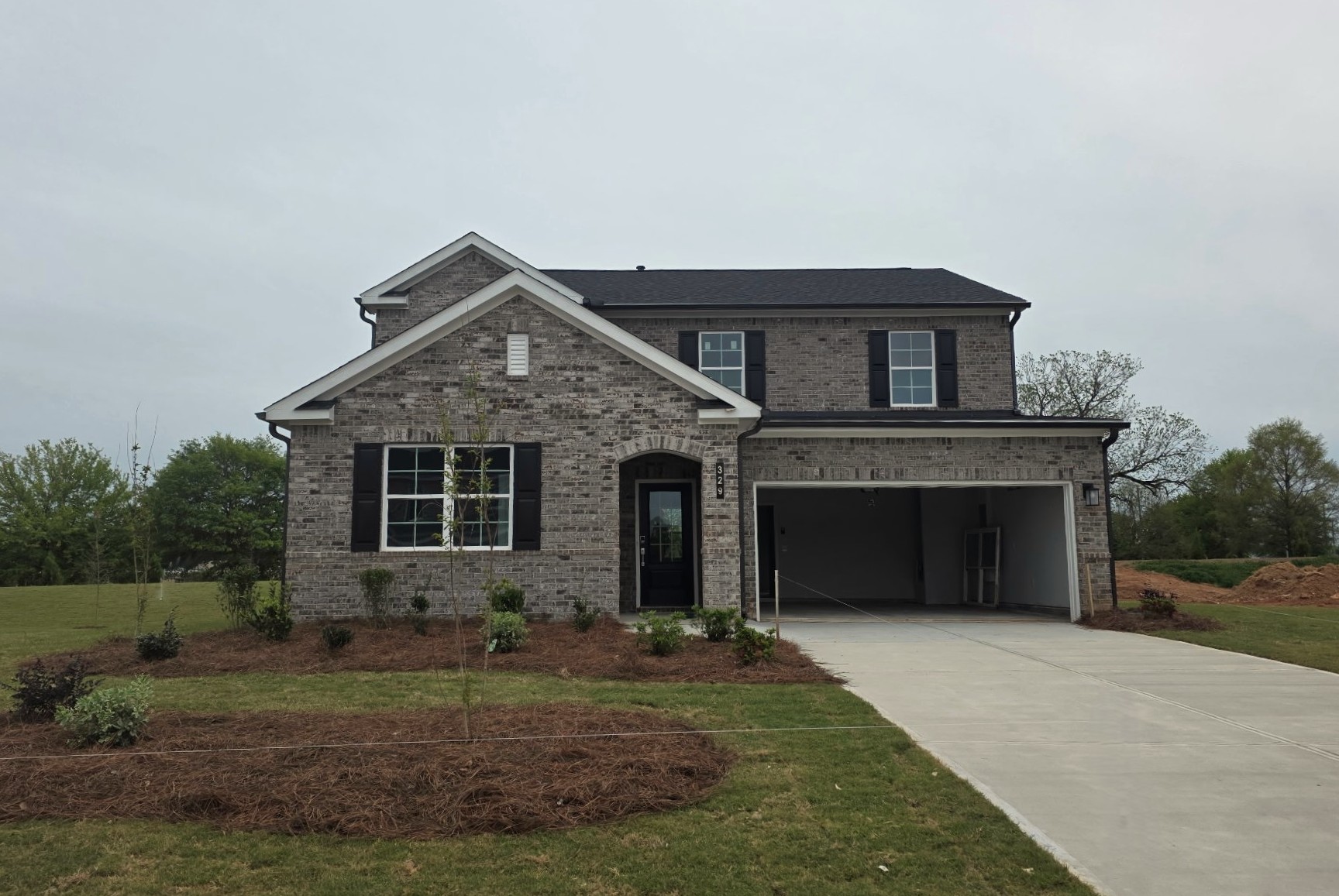 A house with a driveway.