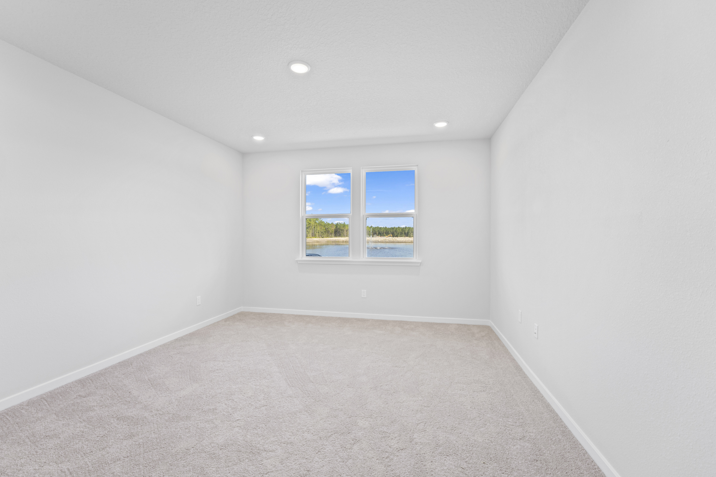 Lot 145 Primary Bedroom with View of Water at Camden Woods in Kingsland