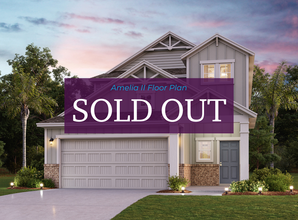 A house with a sign on the front.