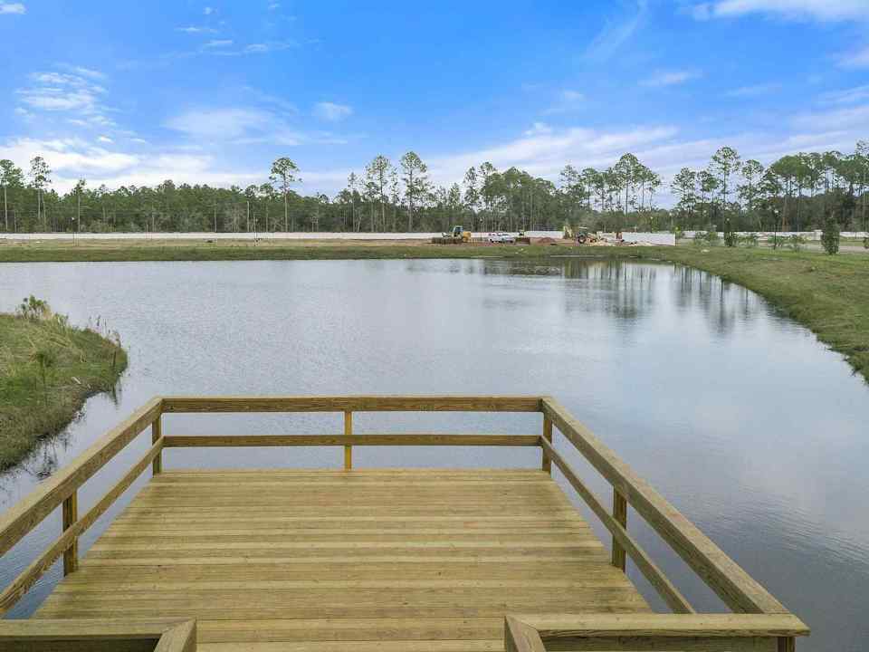 A wooden dock over a body of water.