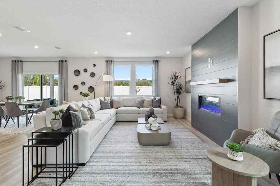 A living room with a fireplace.