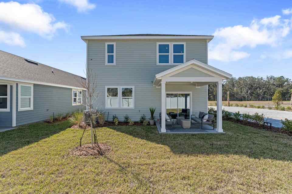 A house with a covered patio.