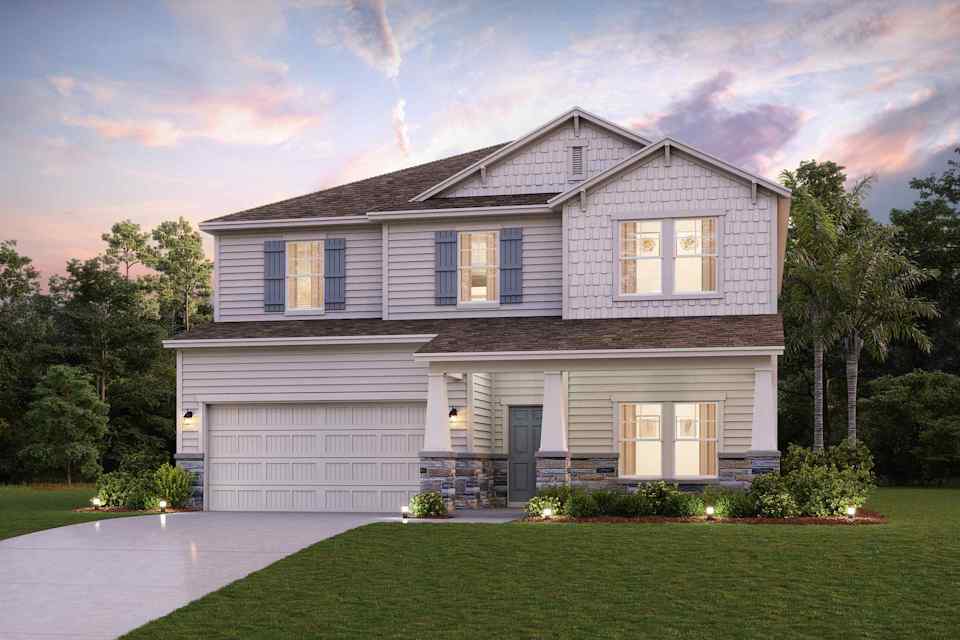 A house with a lawn and trees.