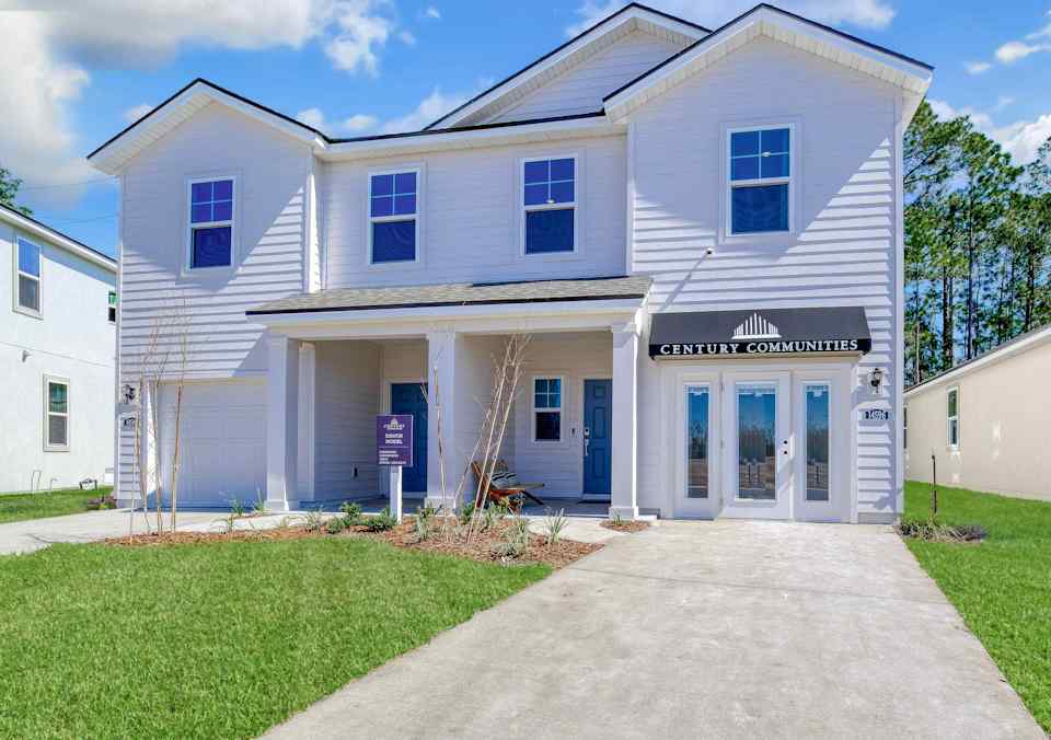 Davor Model Paired Home Front White Exterior at The Landings at Pecan Park