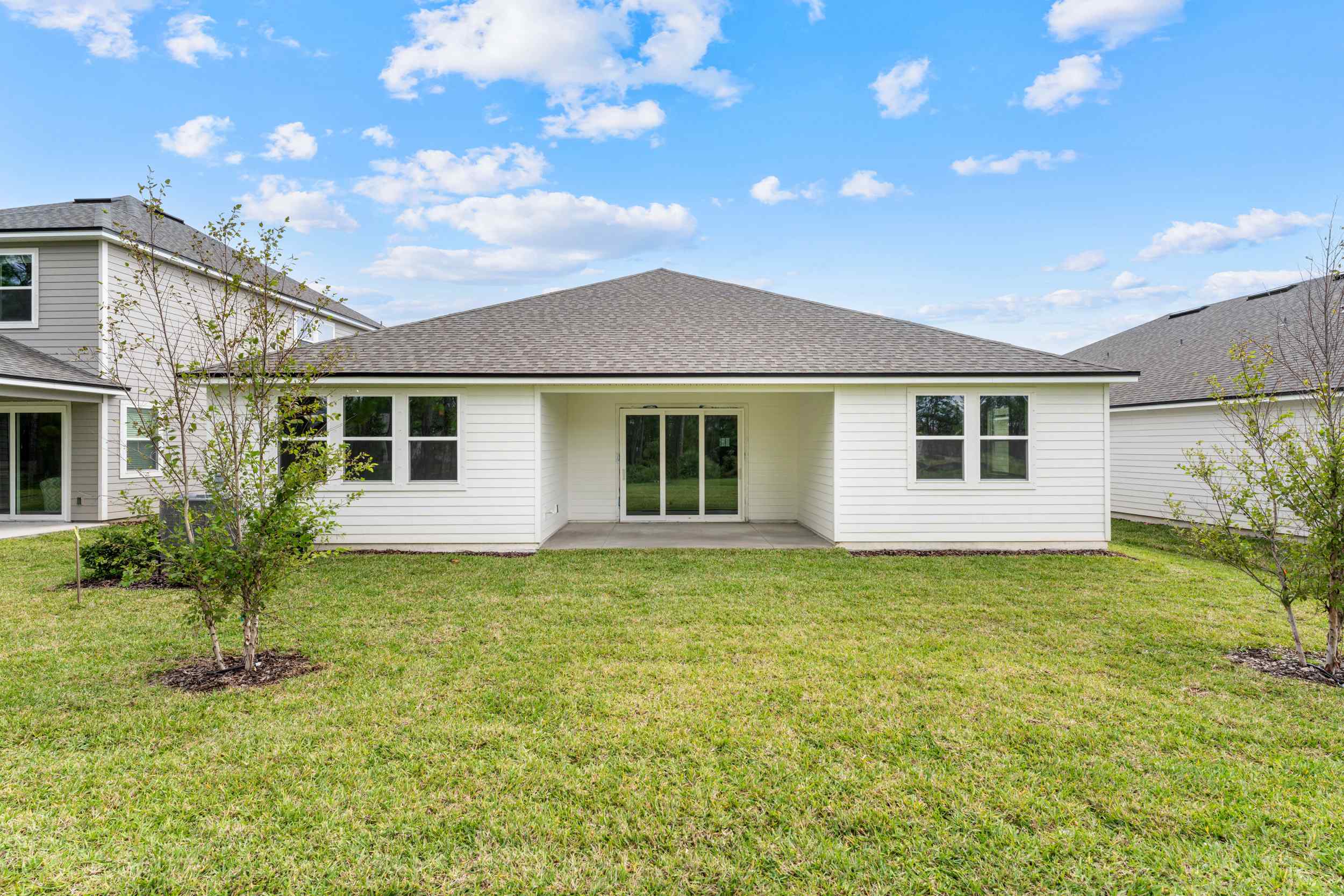Lot 194 Rear Exterior with Covered Patio at Reserve East in Flagler Beach