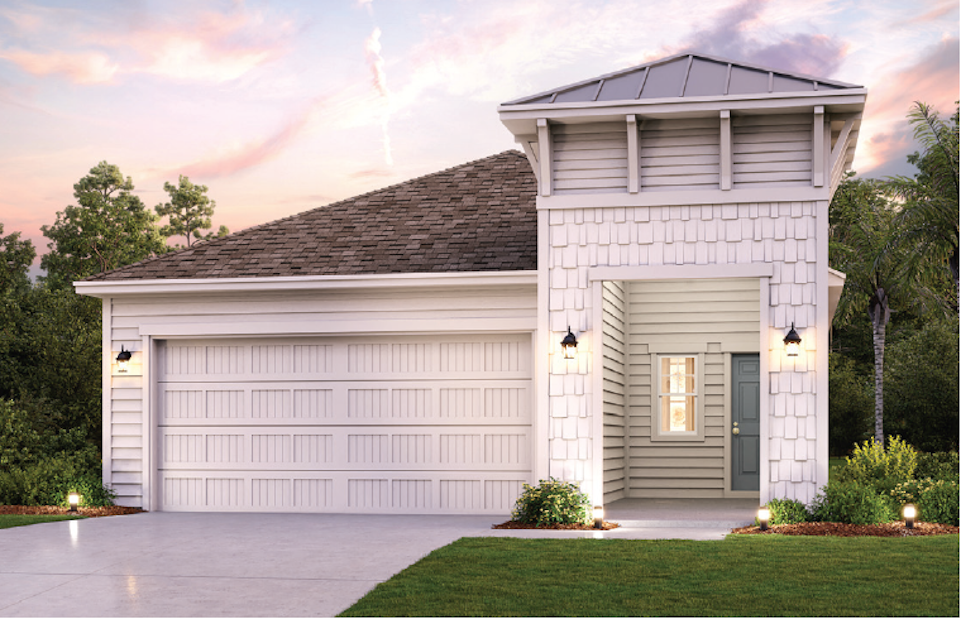 A white house with a garage.