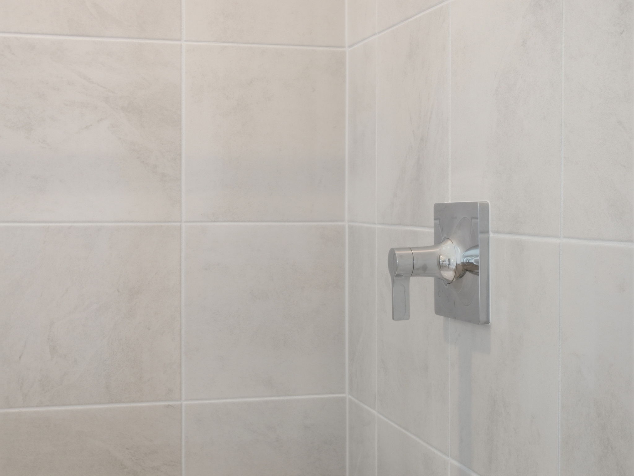 A white tiled wall.