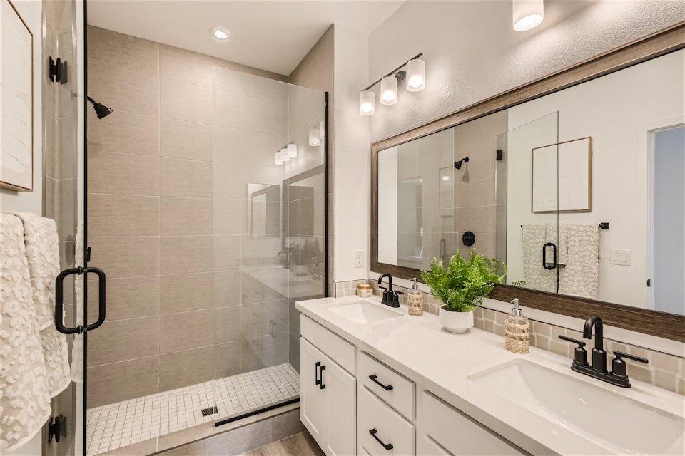 A bathroom with a glass shower.