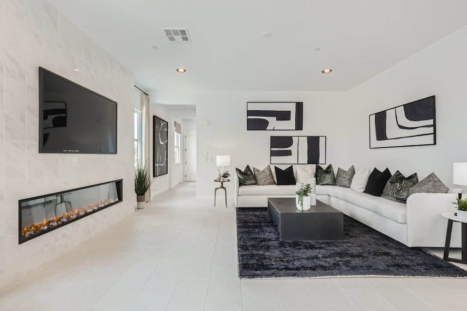 A living room with a fireplace.