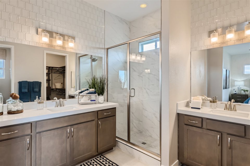 A bathroom with a glass shower.