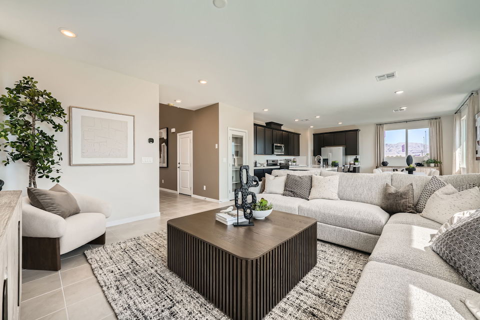 A living room with a couch and a coffee table.