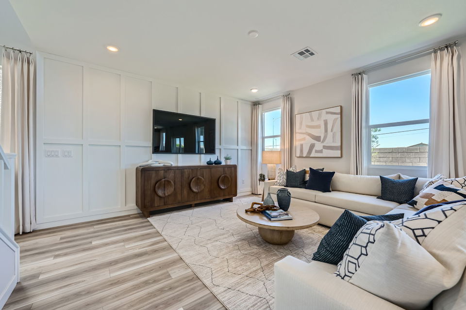 A living room with a large window.