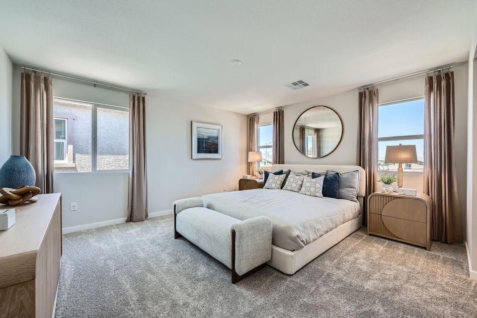 A bedroom with a large bed.