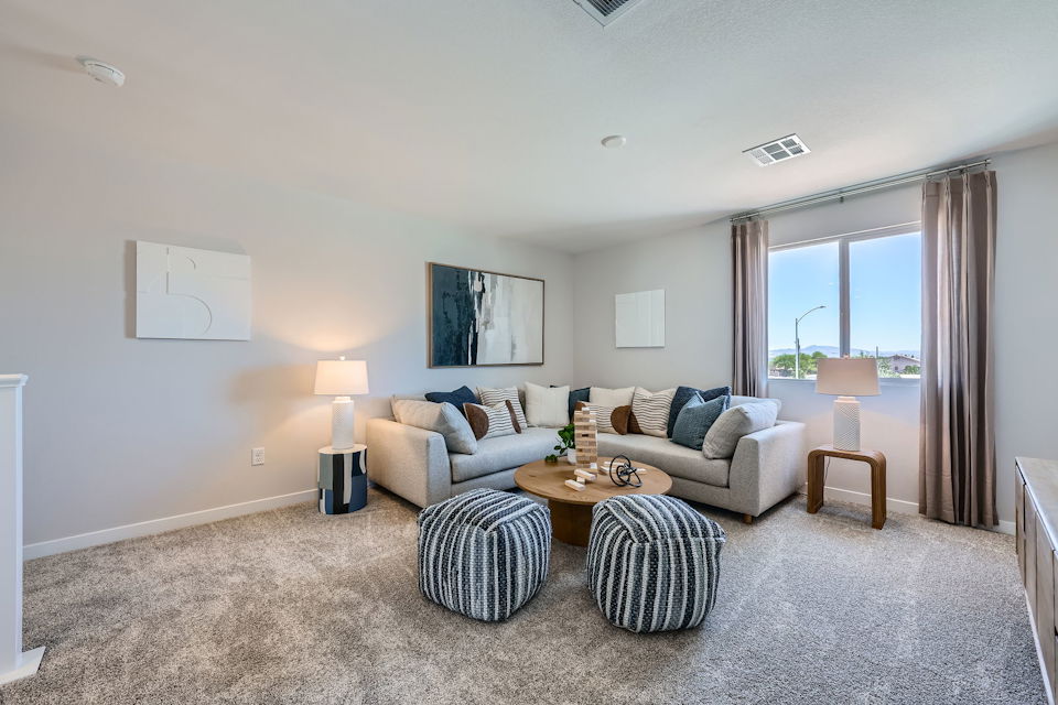 A living room with a couch and a coffee table.