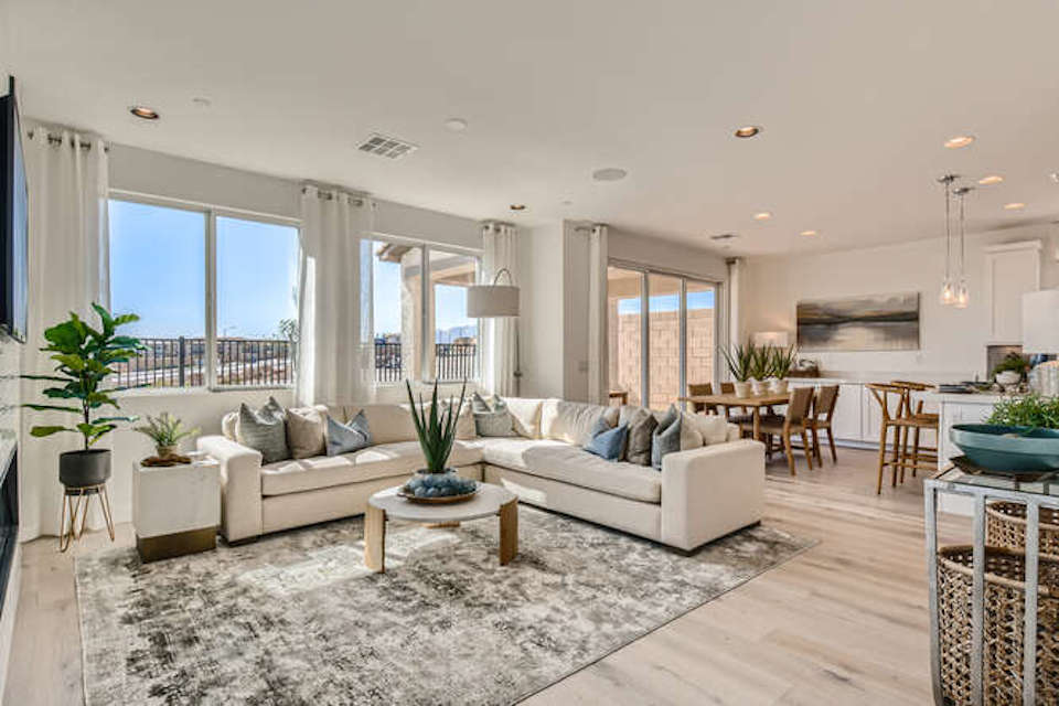 A living room with a large window.