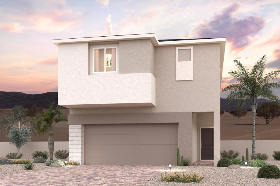 A white house with palm trees.