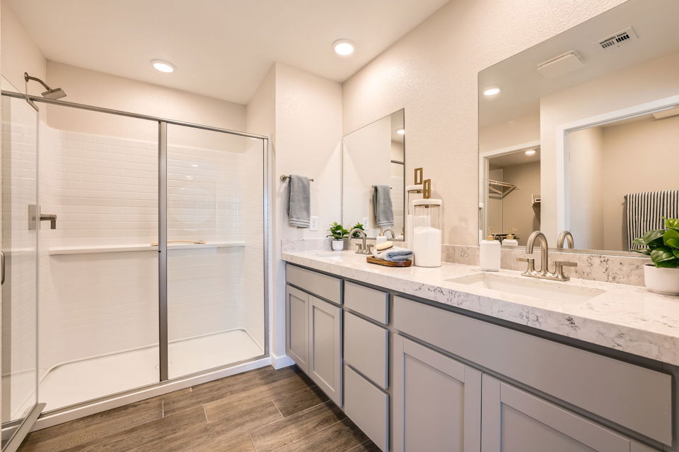 A bathroom with a glass shower.
