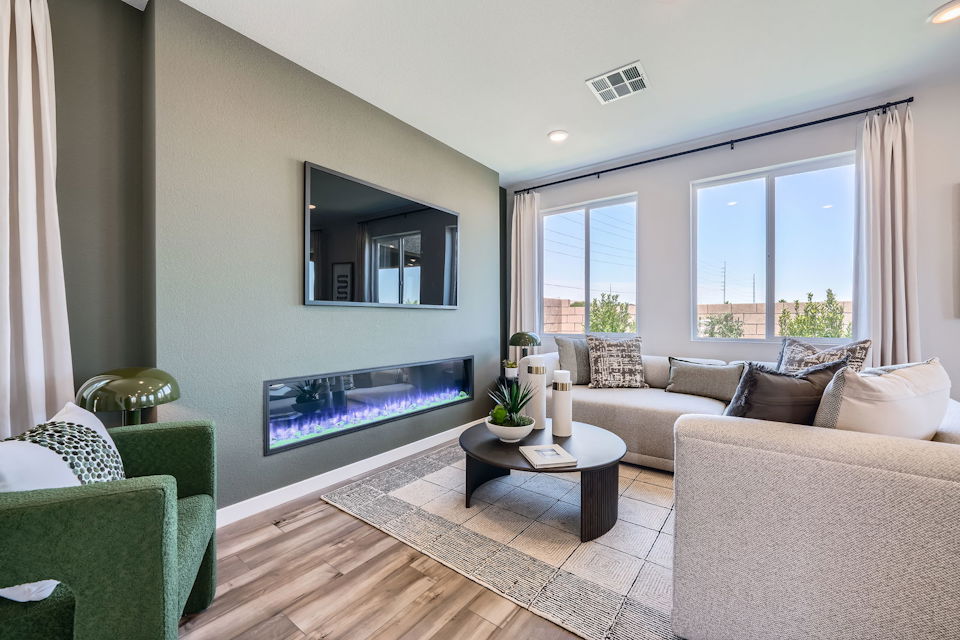A living room with a fireplace.