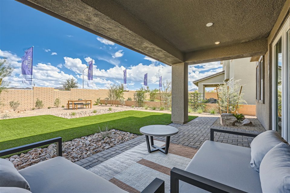 A house with a patio and a pool.