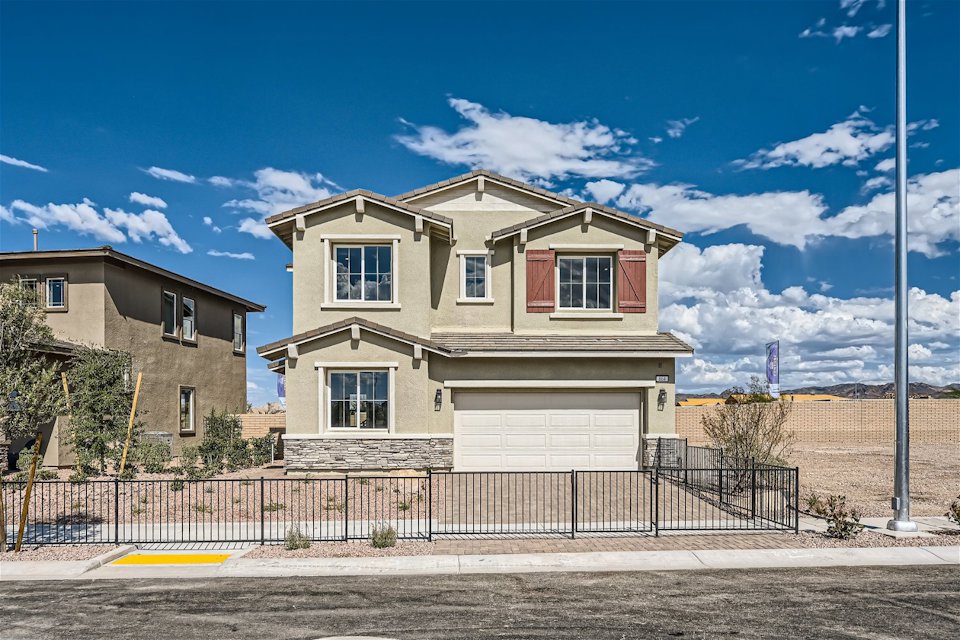 A house with a fence around it.