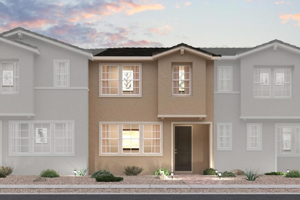 A large house with a driveway.