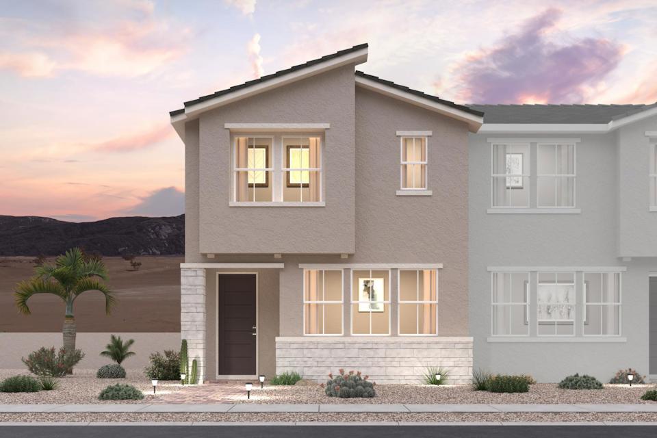 A large house with a driveway.