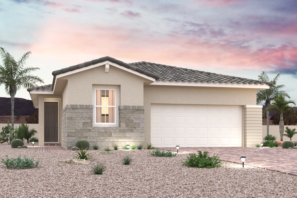 A house with a garage and trees.