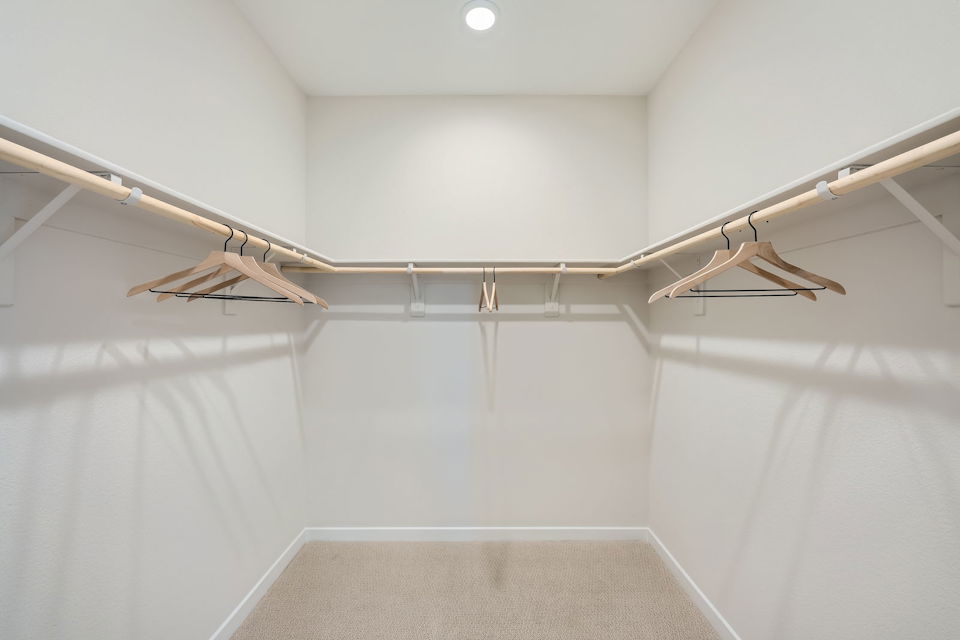 A white room with a white wall and a white floor.