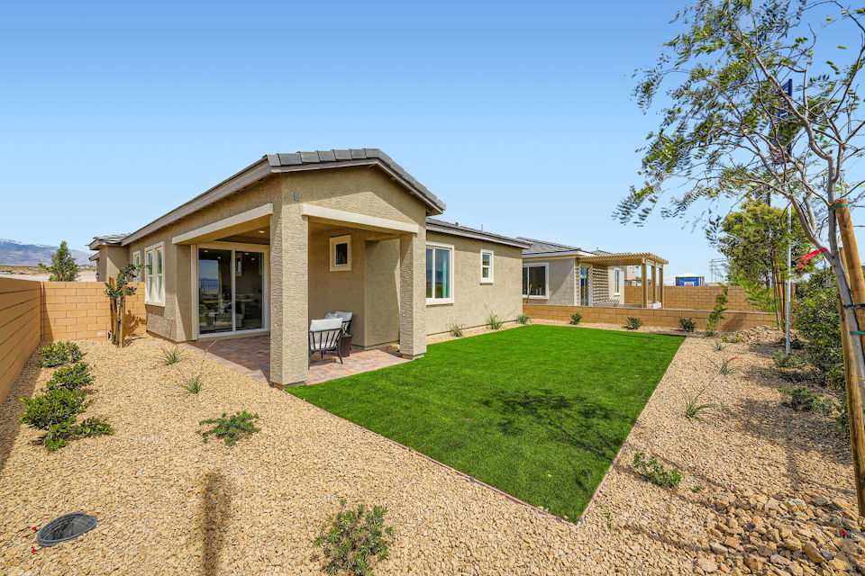 A house with a large front yard.