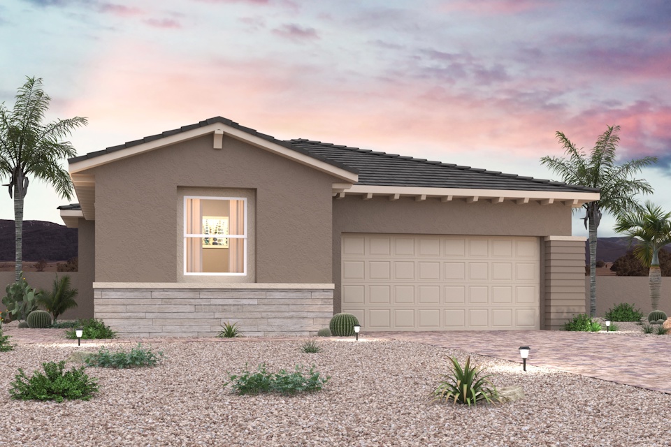 A house with a garage and trees.