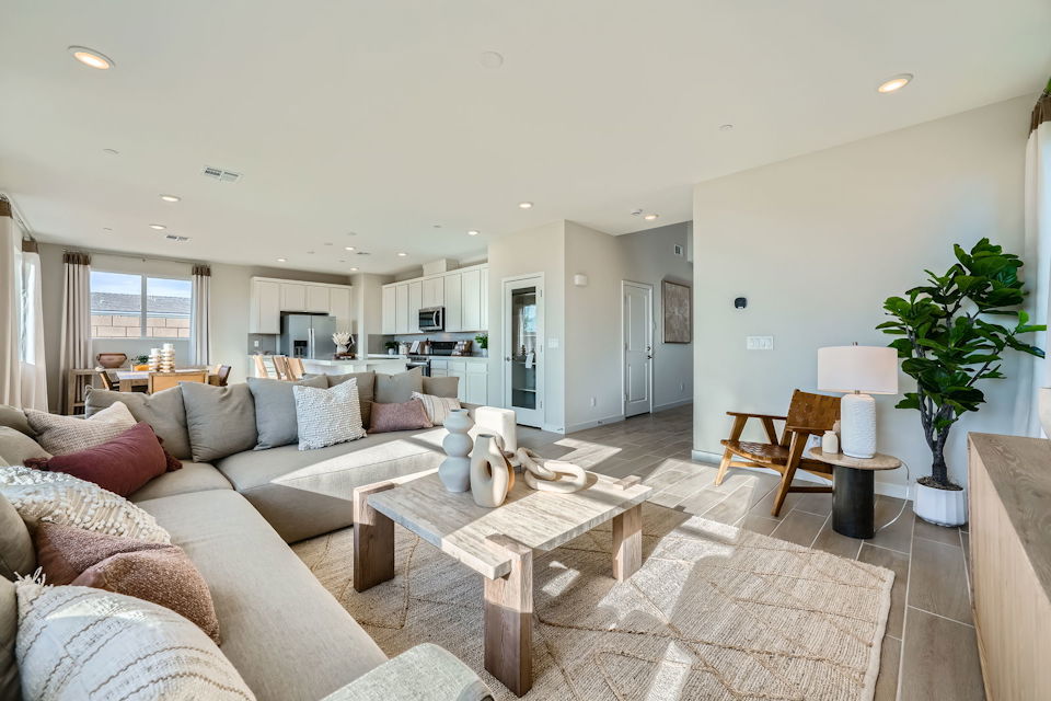 A living room with a couch and a coffee table.