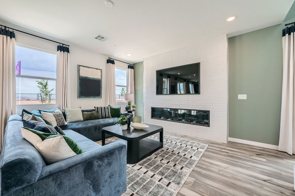 A living room with a fireplace.