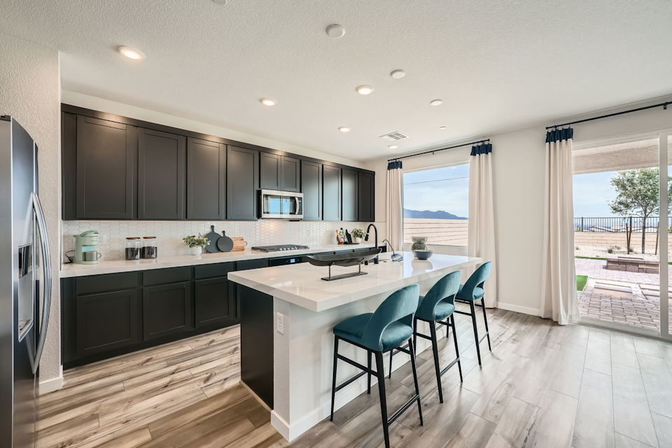 A kitchen with a large island.