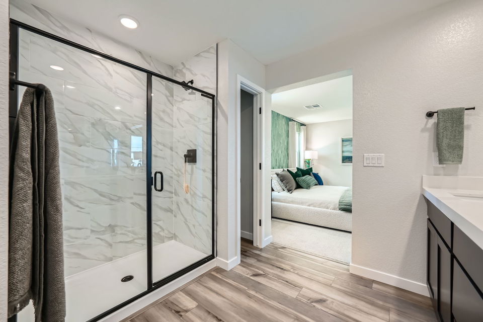 A bathroom with a glass shower.