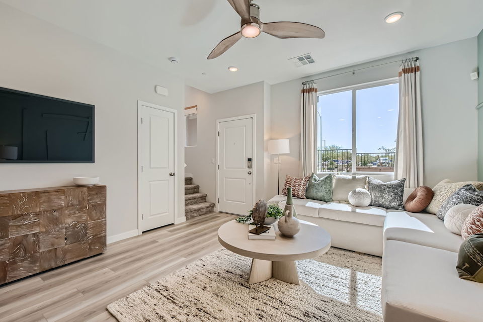 A living room with a large window.