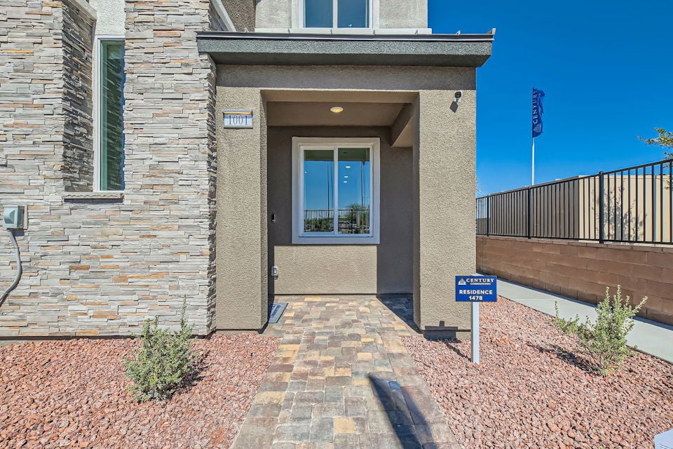 A building with a sign in front.