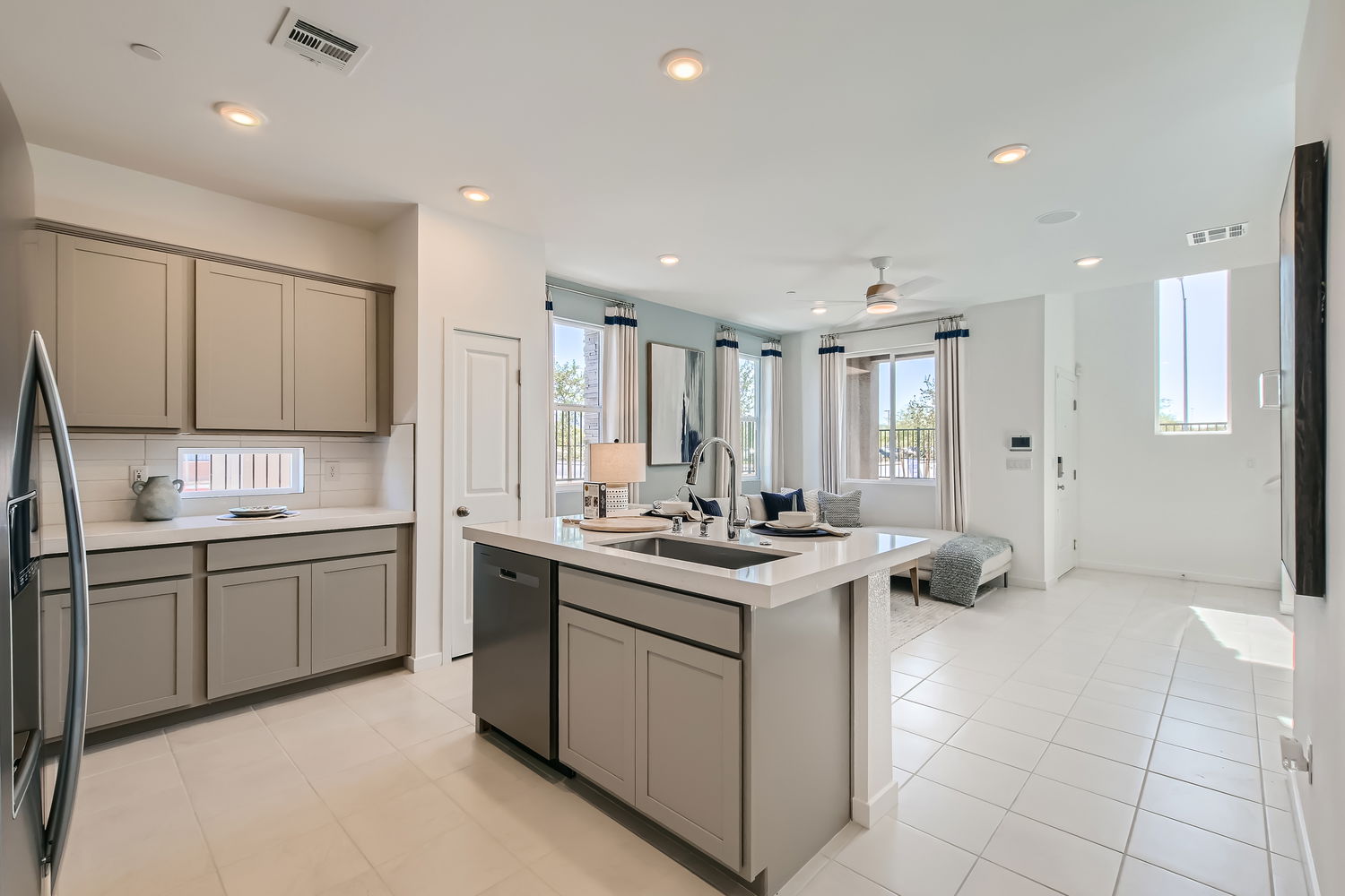 A kitchen with white tile.