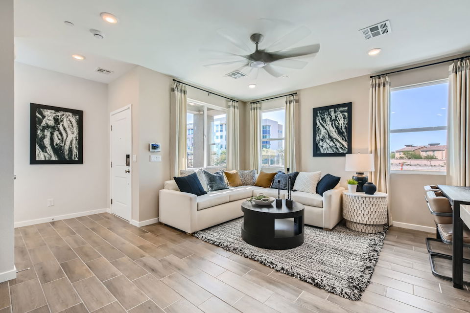 A living room with a large window.