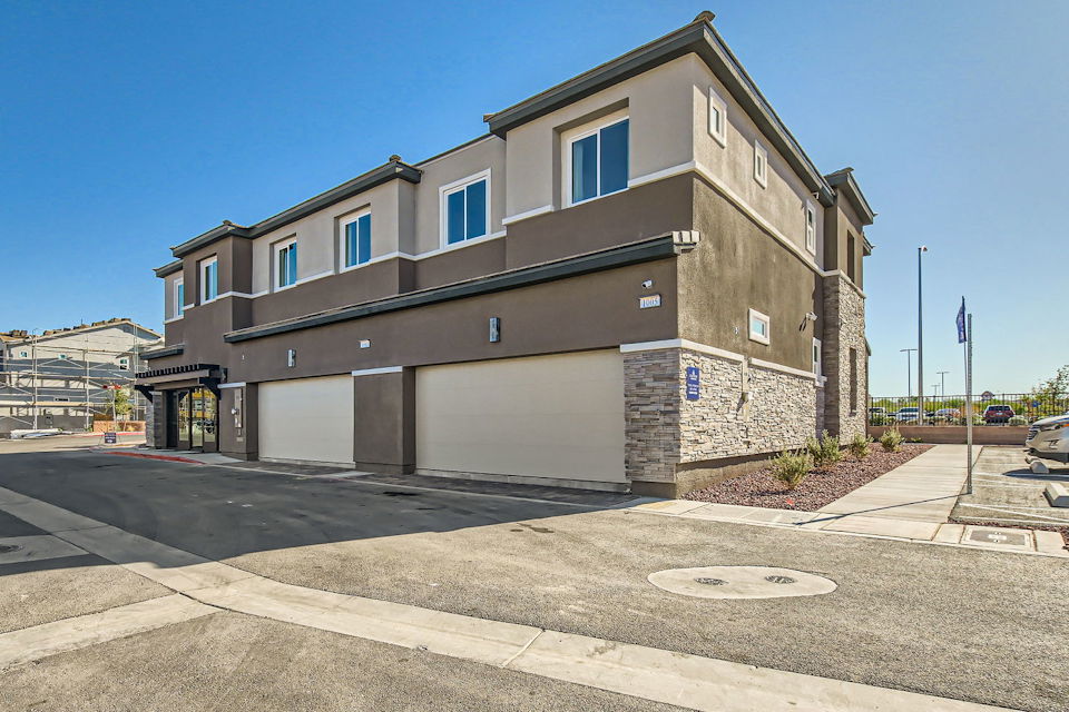 A building with a garage.