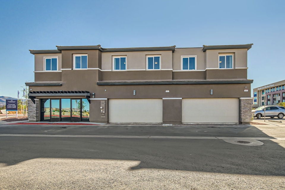 A building with a garage.