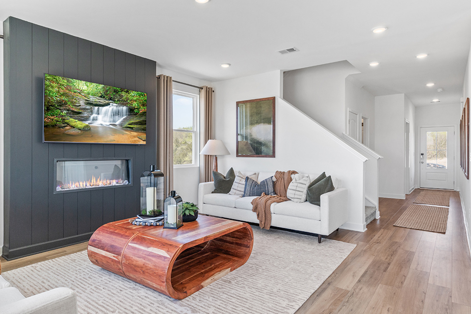 A living room with a fireplace.
